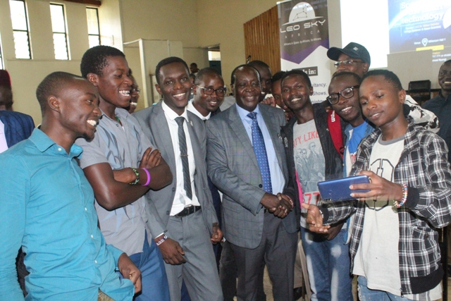 Hon Ottichillo shares a selfie moment with CBPS Students after a public lecture