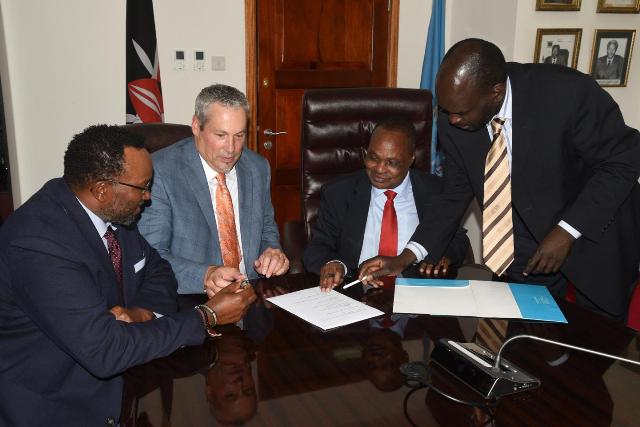President of TTISI International, Mr. Rick Bowers (Left) and Ag. Vice Chancellor, UoN, Prof. Isaac Mbeche sign the MoU.