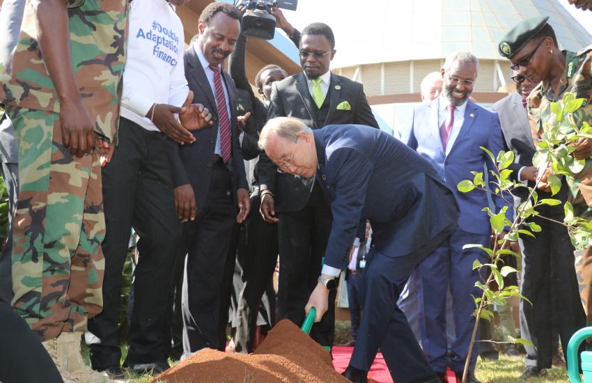 Former UN Secretary-General Ban Ki-Moon plants tree at the Wangari Mathai Institute for Peace and Environmental Studies