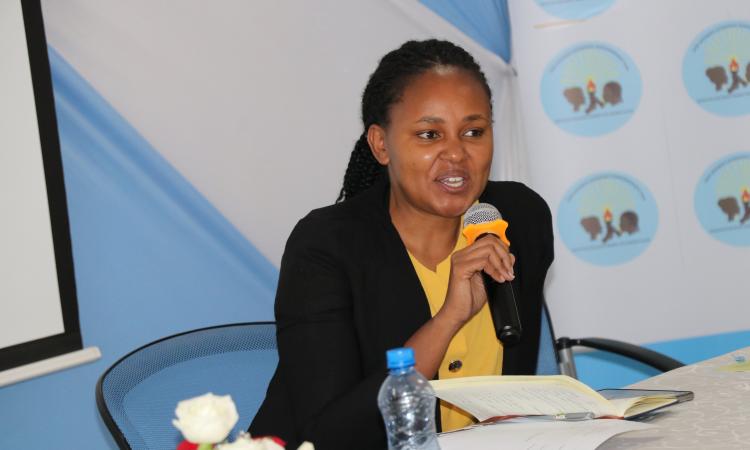Techminds CEO Sarah Kabira addresses participants during International Women's Day celebrations by the WEE Hub in collaboration with Google