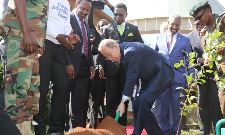 Former UN Secretary-General Ban Ki-Moon plants tree at the Wangari Mathai Institute for Peace and Environmental Studies
