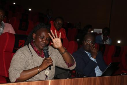 participant contributes to discussions during forum