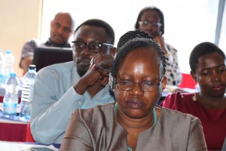 Participants follow discussions during workshop